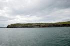 Kilcredaun Cliffs in the vicinity of the Kilcredaun lighthouse. Outcropping in these cliffs are thin bedded turbidite channel fill and turbidite sand lobes in the Upper Carboniferous Namurian Ross Formation. Photographs taken from the fishing vessel Draiocht out of Carrigaholt on the northern shore of the Shannon Estuary.