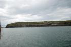 Kilcredaun Cliffs in the vicinity of the Kilcredaun lighthouse. Outcropping in these cliffs are thin bedded turbidite channel fill and turbidite sand lobes in the Upper Carboniferous Namurian Ross Formation. Photographs taken from the fishing vessel Draiocht out of Carrigaholt on the northern shore of the Shannon Estuary.