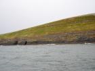 West end of Rehy Cliffs thin bedded inter channel area at western feather edges of deepwater channel wings. Ross Formation sands are probably in mid fan position on edge of the fan body.