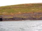 West end of Rehy Cliffs thin bedded inter channel area at western feather edges of deepwater channel wings. Ross Sandstone Formation probably in mid fan position on edge of the fan body.