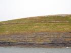 West end of Rehy Cliffs thin bedded inter channel area at western feather edges of deepwater channel wings. Ross Sandstone Formation probably in mid fan position on edge of the fan body.