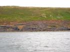 East end of Rehy Cliffs beyond monoclinical fold in deepwater Ross Formation sands. The interbedded shales and sands suggest a more distal position at the edge of a deepwater fan body.