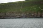 Rehy Cliffs two offset but stacked deepwater channels. Morphology and frequency suggest a mid turbidite fan position for these Ross Sands. These lower sandbodies are erosionally amalgamated and show wing like extension into finer sediment.