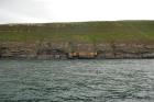 Rehy Cliffs two offset but stacked deepwater channels. Morphology and frequency suggest a mid turbidite fan position for these Ross Sands. These lower sandbodies are erosionally amalgamated and show wing like extension into finer sediment.