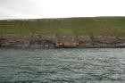 Rehy Cliffs two offset but stacked deepwater channels. Morphology and frequency suggest a mid turbidite fan position for these Ross Sands. These lower sandbodies are erosionally amalgamated and show wing like extension into finer sediment.