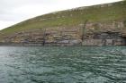 Rehy Cliffs mid turbidite fan channel of Ross Formation sands close to today's sea level. It is overlain by a diversity of thin interchannel sands.