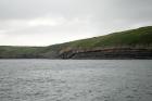 West end of Rehy Cliffs thin bedded inter channel area at western feather edges of deepwater channel wings. Ross Formation sands are probably in mid fan position on edge of the fan body.