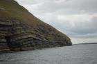 West end of Rehy Cliffs. Note details of thin bedded inter channel area at western feather edges of deepwater channel wings. Ross Sandstone Formation probably in mid fan position on edge of the fan body.