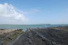 Eastern Rinevilla Point wave cut platform outcrops of Namurian Ross Formation. Note thin deepwater turbidite sheet sands of filled channels of the fan lobes.