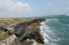 Western Rinevilla Point wave cut platform outcrops of Namurian Ross Formation. Overview of inclined turbidite channel margin fill sheet sands.