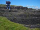 Upper Carboniferous or Namurian aged Tullig Formation silts and mud. Climbing ripples in rythmic silts and mud interbeds. Depositional setting interpreted to be a delta front with the climbing ripple facies formed within wave base (Andy Pulham personal comunication & Martinsen et al., 2008).