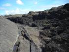 Rhymically bedded silts and muds from at and below wave base in the Tulllig Formation.