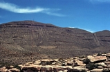 View to east from close to the base of the El Capitan Reef overlook. This is a distant view of mainly interfingering mixed deepwater clastic fill of channels of mid slope. Mainly by passing Brushy Canyon clastics that underlie the Capitan Limestone Reef . This latter is not in this photograph but is to the west of here.