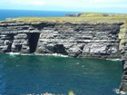 Atlantic margin of Loop Head Co Clare exposing mid to distal sparsely channelled deepwater fan sheets.