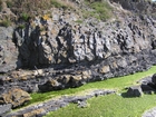 Shannon estuary coast just SE of Loop Head Co Clare at Kilbaha Bay. exposing amalgamated channelled deepwater fan sand sheets. Note that below the channelled sand the cut and fill of the underlying inter fan overbank shales.