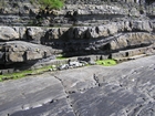 Shannon estuary coast just SE of Loop Head Co Clare at Kilbaha Bay. exposing a megaflute cut in the margin of the channel of an amalgamated channelled deepwater fan sand sheet. Note above and below the channelled sheet sands and shales of mid fan.